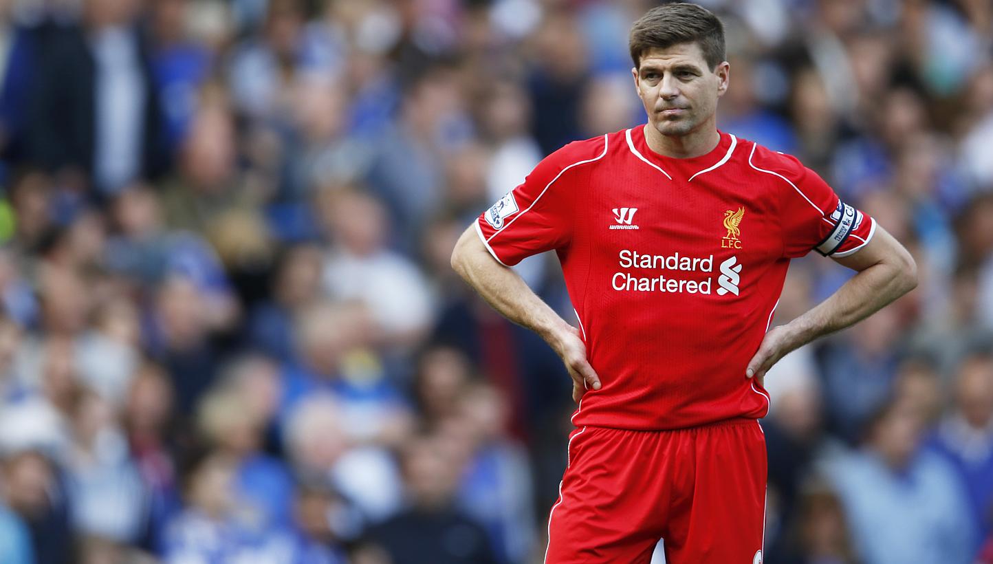 Liverpool's captain Steven Gerrard looks dejected as hopes of Champions League qualification for Liverpool were all but ended on Sunday when they drew 1-1 at newly crowned Premier League champions Chelsea in a langourous end-of-season encounter. -- P