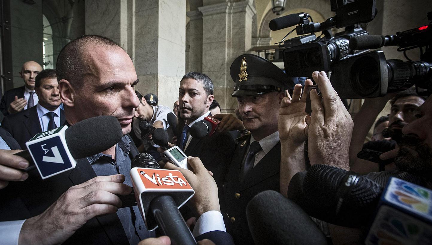 Greek Finance Minister Yanis Varoufakis (left) leaving after meeting his Italian counterpart Padoan in Rome, Italy, on May 6, 2015 in preparation for a Eurozone finance ministers meeting scheduled for May 11, 2015. -- PHOTO EPA