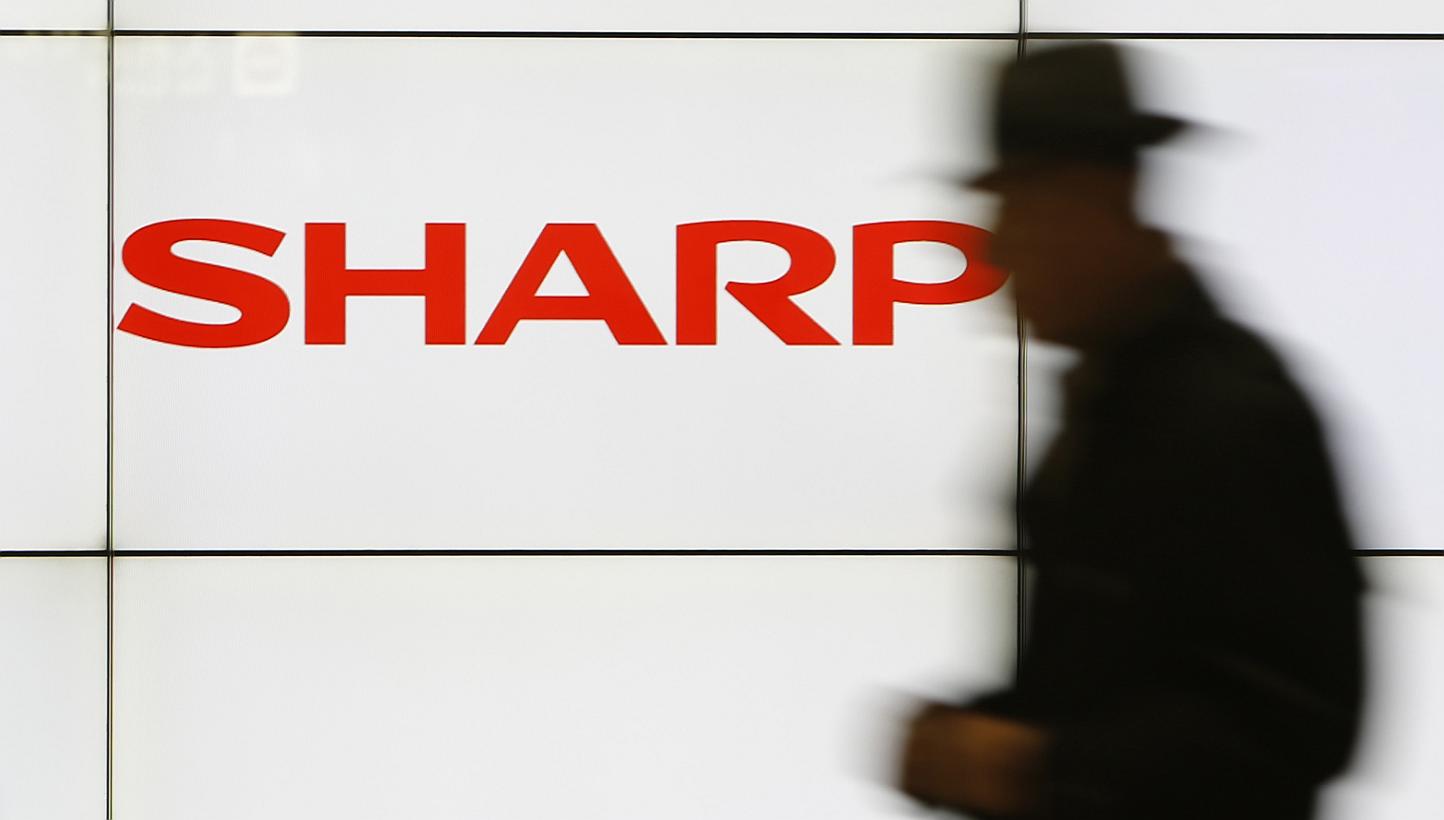 Shares in Japan's Sharp plunged 31 per cent on Monday after weekend media reports that the struggling electronics maker is planning a drastic capital reduction to help wipe away losses. -- PHOTO: REUTERS