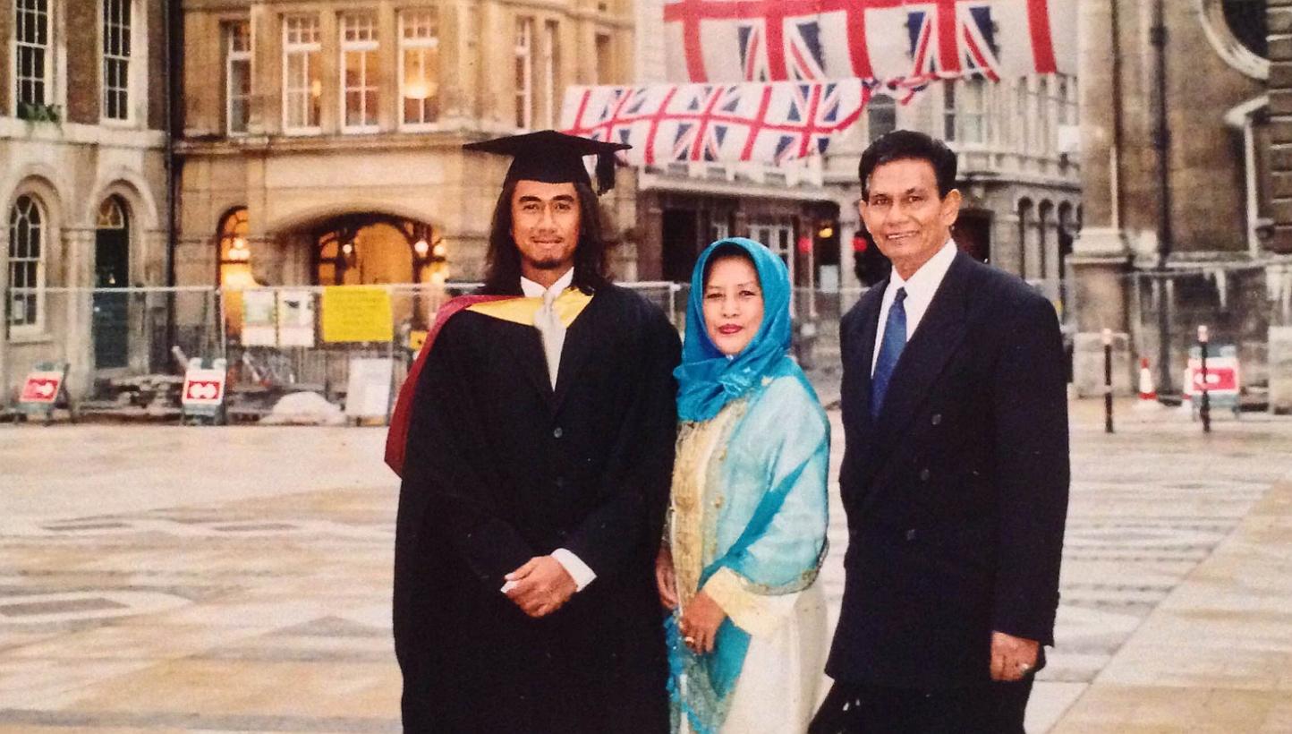 Art with his parents after graduating with a diploma in professional music development in London in 2003. -- PHOTO: COURTESY OF ART FAZIL