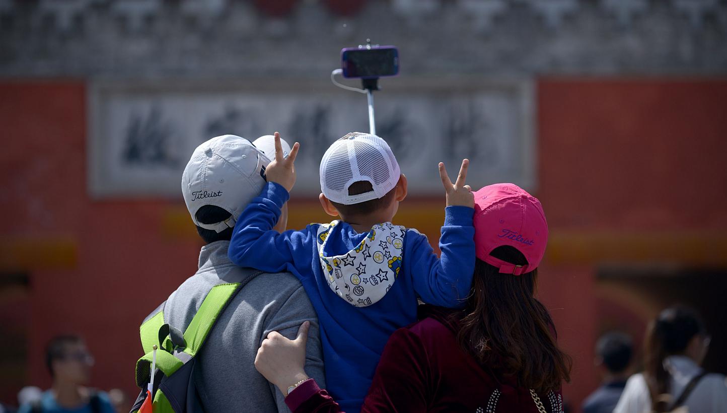 Chinese police have nabbed a fugitive after managing to track him down through the holiday selfies the man had posted on social media, the Xinhua news agency reported on Monday. Picture for illustration. -- PHOTO: AFP