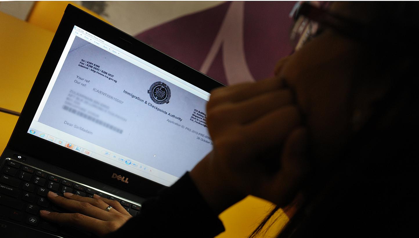 An Immigration and Checkpoints Authority of Singapore (ICA) application form is seen on a laptop. Individuals who provide false information in their Singapore citizenship or permanent residency applications will be "dealt with firmly", says Second Mi
