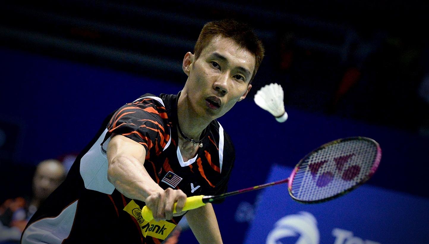 Lee Chong Wei of Malaysia returns to Dong Keun Lee of Korea during their men's singles match match of the 2015 Sudirman Cup world badminton championships in Dongguan, south China's Guangdong province on Sunday.-- PHOTO: AFP&nbsp;
