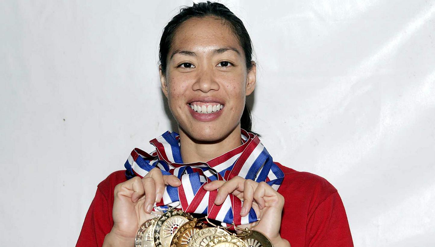 On any medal table Pat Chan and Joscelin Yeo (above) would be a high-ranking nation by themselves. You going to choose a footballer over them to light the flame?