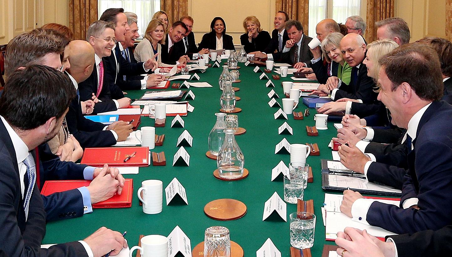 British Prime Minister David Cameron (seventh left) hosts the first weekly Cabinet meeting in Downing Street, central London, on May 12, 2015, following the May 7 general election.&nbsp;Cameron will hold an early referendum on membership of the Europ