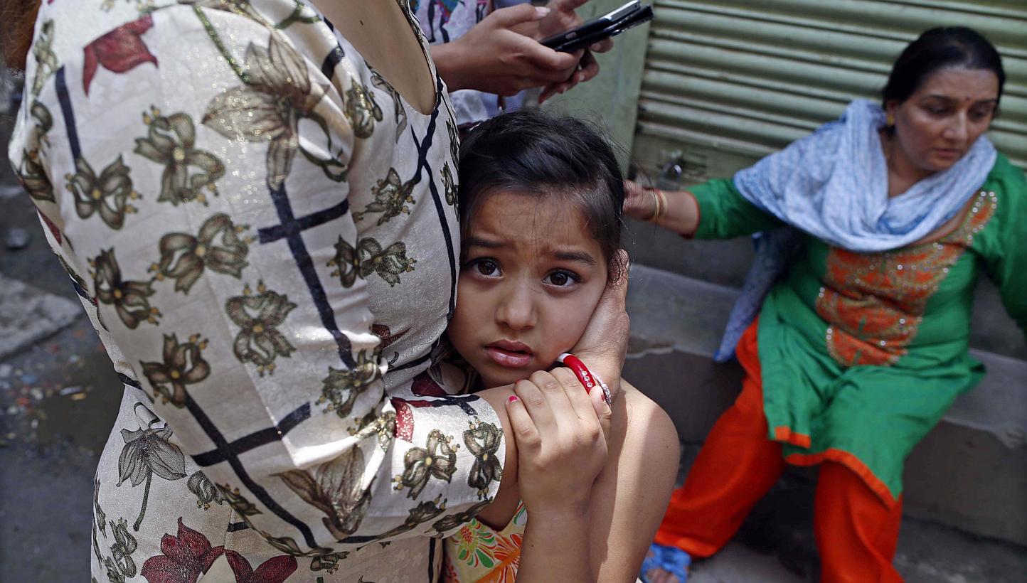Nepalese search for open space as a strong earthquake hits Kathmandu, Nepal, on May 12, 2015. -- PHOTO: EPA
