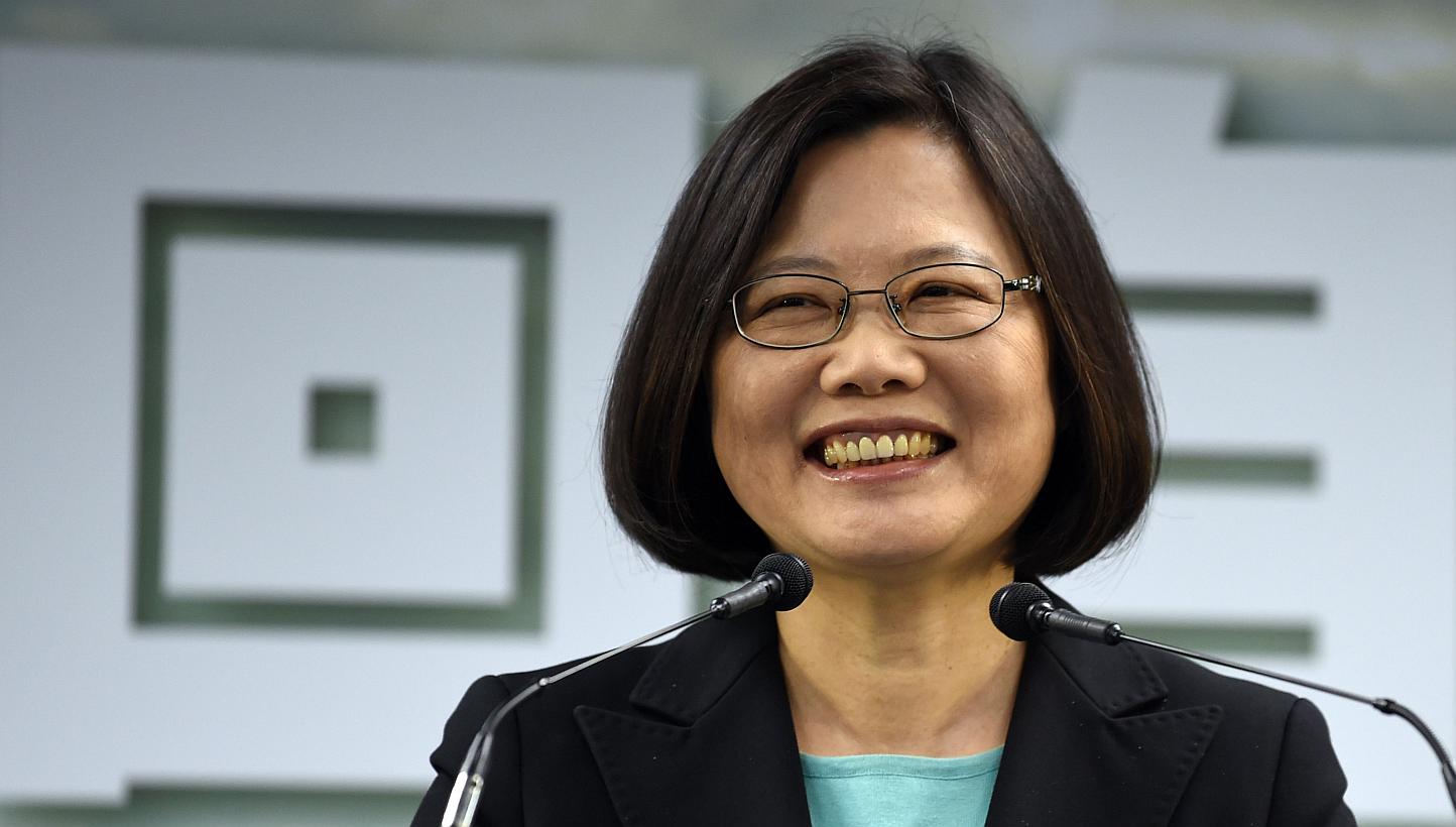 Tsai Ing-wen, chairwoman of Taiwan's main opposition Democratic Progressive Party (DPP), smiles during a press conference in Taipei on April 15, 2015. -- PHOTO: AFP