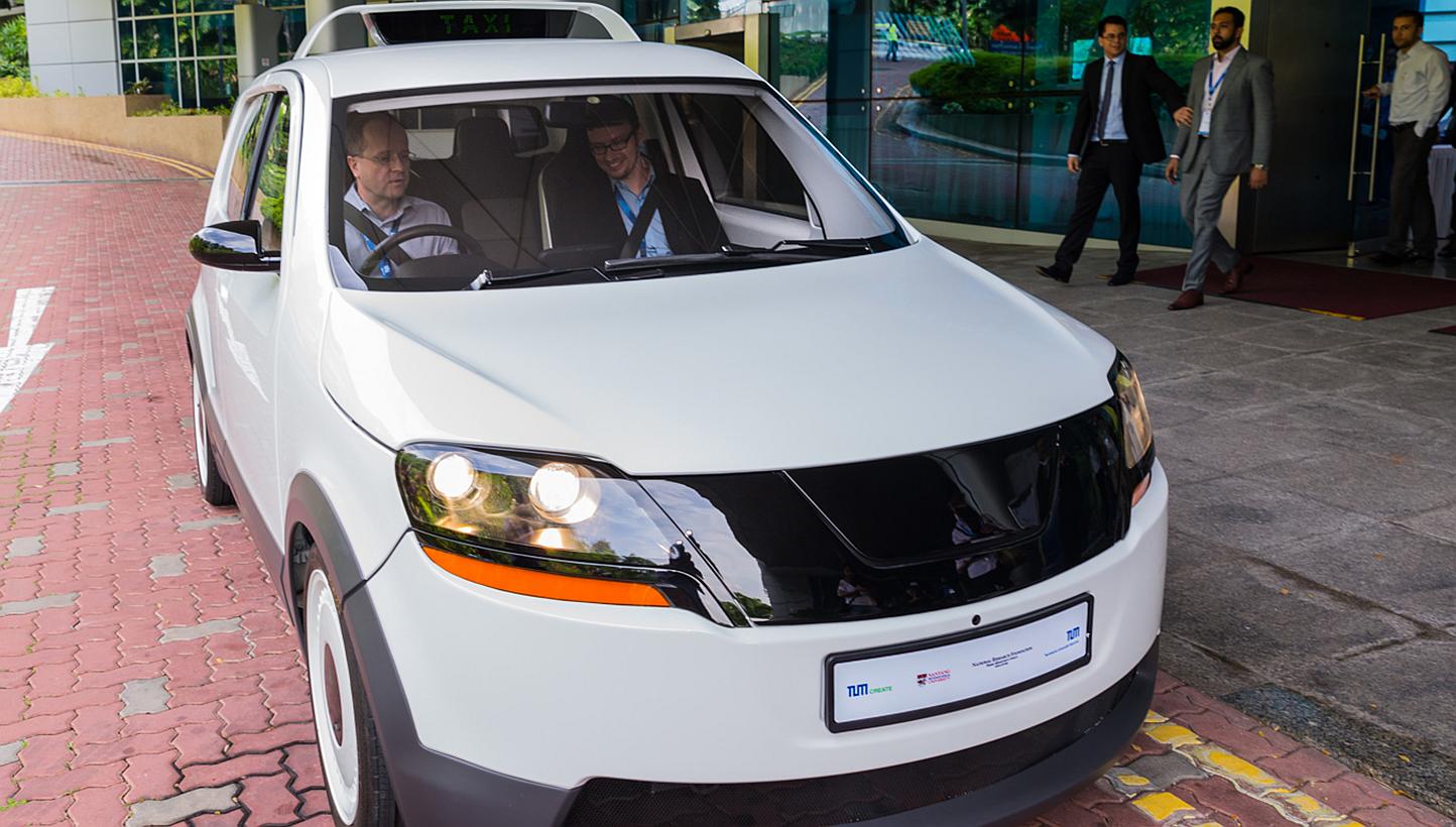 EVA, the taxi designed and built here by TUM Create - a collaboration between Nanyang Technological University and Germany's Technische Universitat Munchen - has a 200km range and a charging time of just 15 minutes. -- PHOTO: TUM CREATE