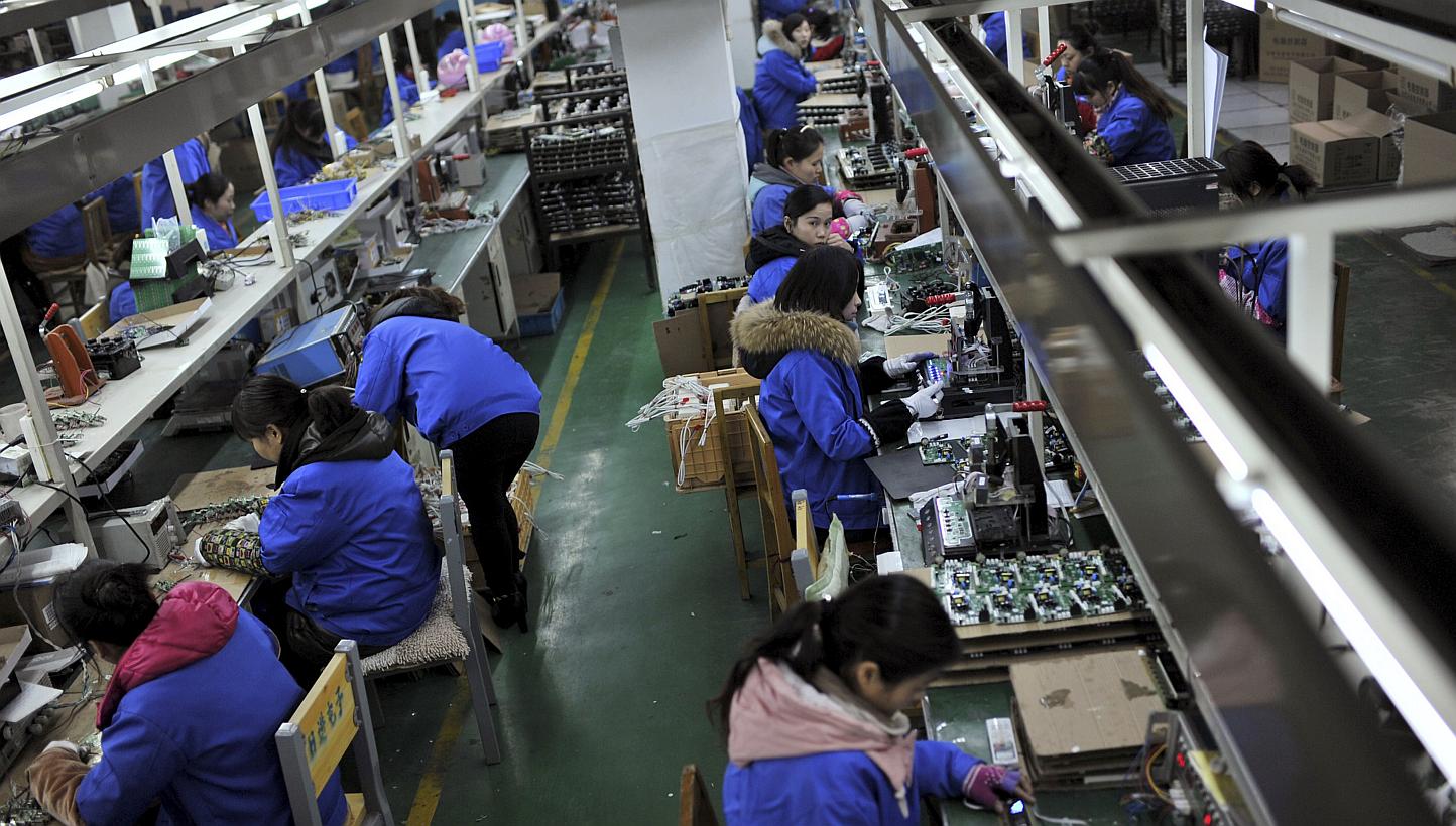 China's industrial output growth ticked higher in April while investment slowed to the weakest pace in more than 14 years, suggesting monetary easing is trickling through the economy while more may be needed to spur a pick up. -- PHOTO: REUTERS