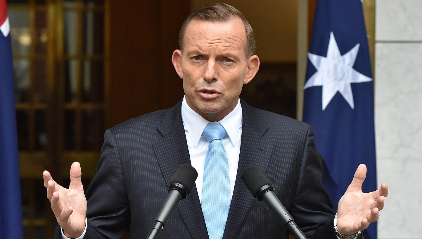 Australia's Prime Minister Tony Abbott speaking during a press conference after retaining the leadership of the Liberal party at Parliament House in Canberra on Feb 9, 2015. -- PHOTO: AFP