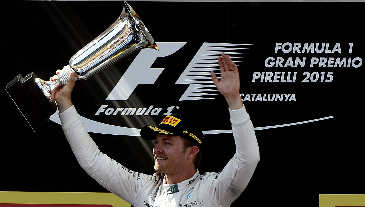 Mercedes AMG Petronas F1 Team's German driver Nico Rosberg celebrates on the podium after the Spanish Formula One Grand Prix on May 10, 2015 at the Circuit de Catalunya in Montmelo on the outskirts of Barcelona. -- PHOTO: AFP