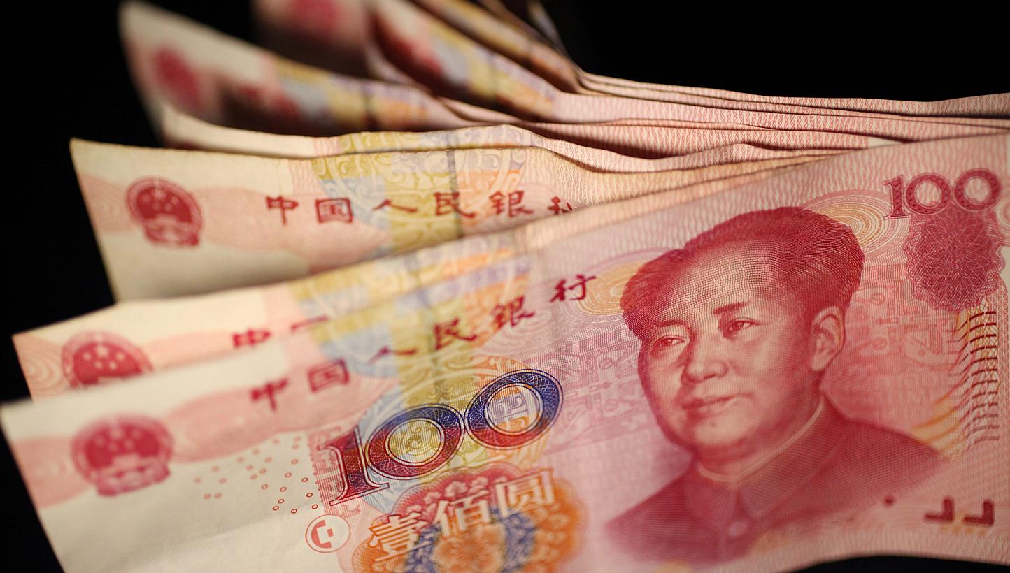 China is unlikely to engineer a competitive devaluation of the yuan as it seeks reserve currency status, according to one of the world's biggest bond funds Pacific Investment Management Co. (Pimco). -- PHOTO: EPA