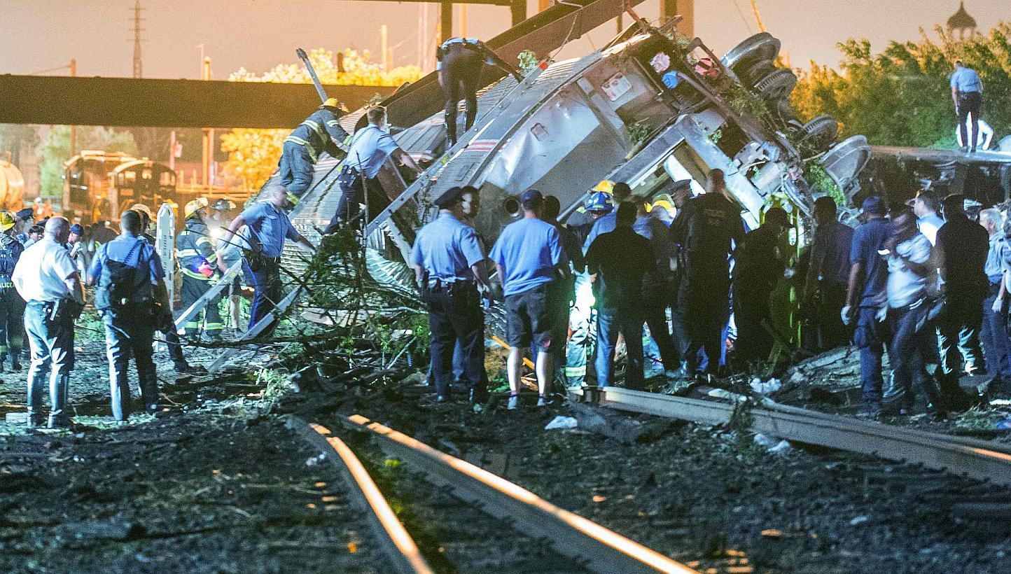 Emergency responders search for passengers following an Amtrak train derailment in the Frankfort section of Philadelphia, Pennsylvania, May 12, 2015.&nbsp;Search teams have recovered the black box from an Amtrak train that derailed in Philadelphia an