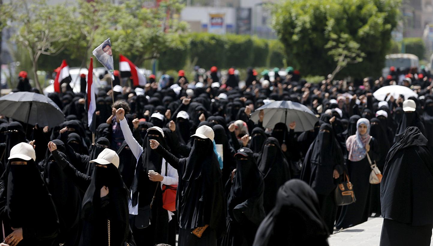 Women loyal to the Houthi group participate in an anti-Saudi protest outside the United Nations headquarters in Sanaa May 14, 2015.&nbsp;&nbsp;A vigilante group linked to Al-Qaeda in the eastern port city of Mukalla has decreed a ban on trading the m