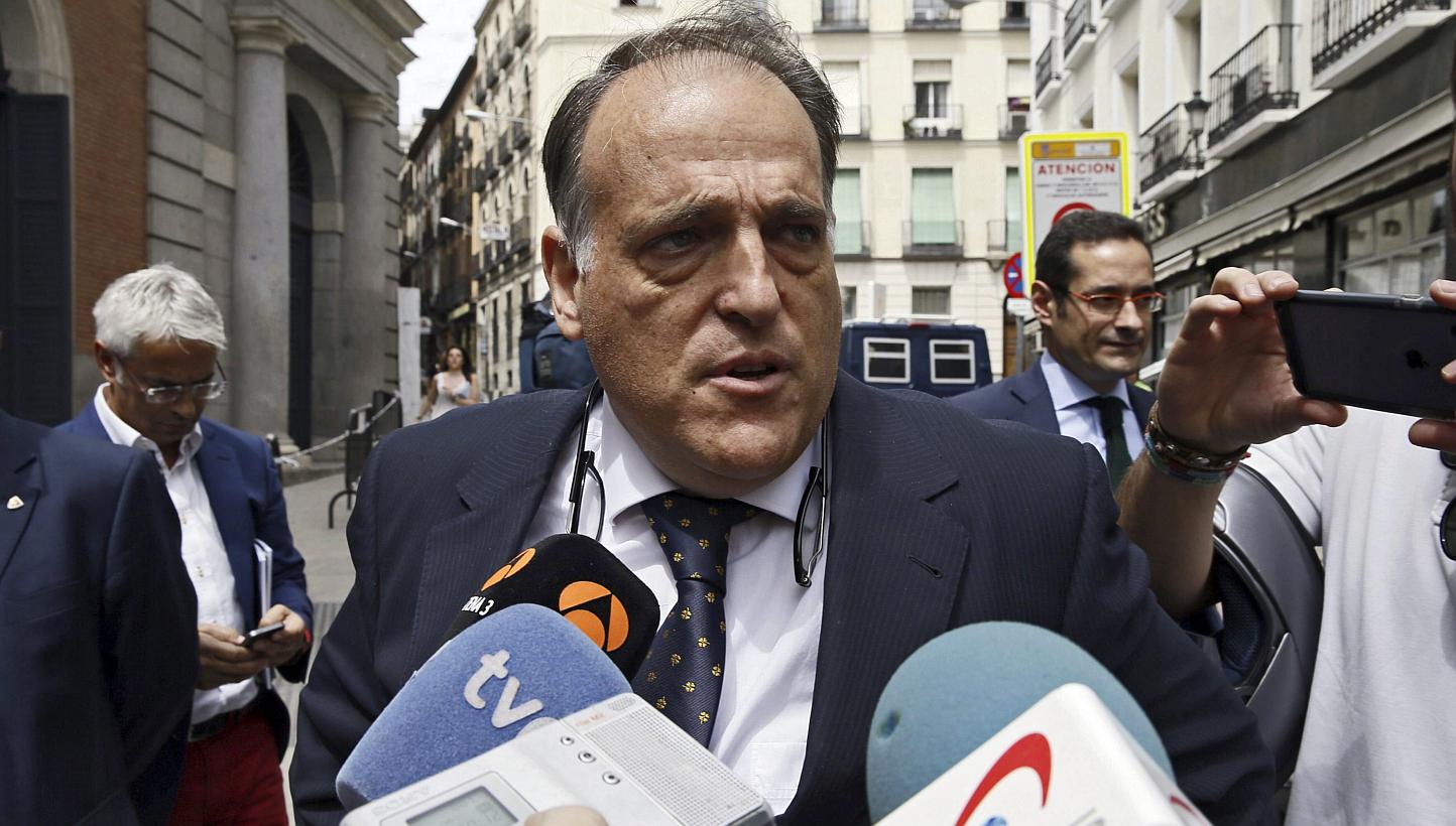 President of Spanish Professional Football League (LFP), Javier Tebas, addresses the media as he arrives to the Parliament's Lower Chamber to attend the voting of the government decree ruling the central sale of television rights of the league matche