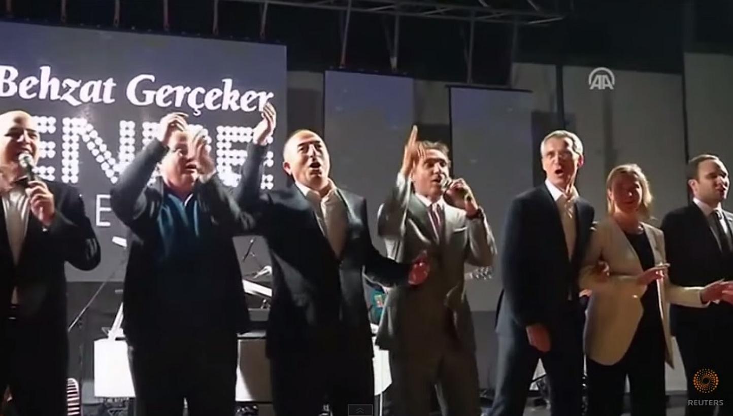 A screenshot from a video posted online of the We Are The World rendition at a&nbsp;dinner thrown for Nato foreign ministers at their two-day meeting in the southern Turkish city of Antalya. -- PHOTO: YOUTUBE