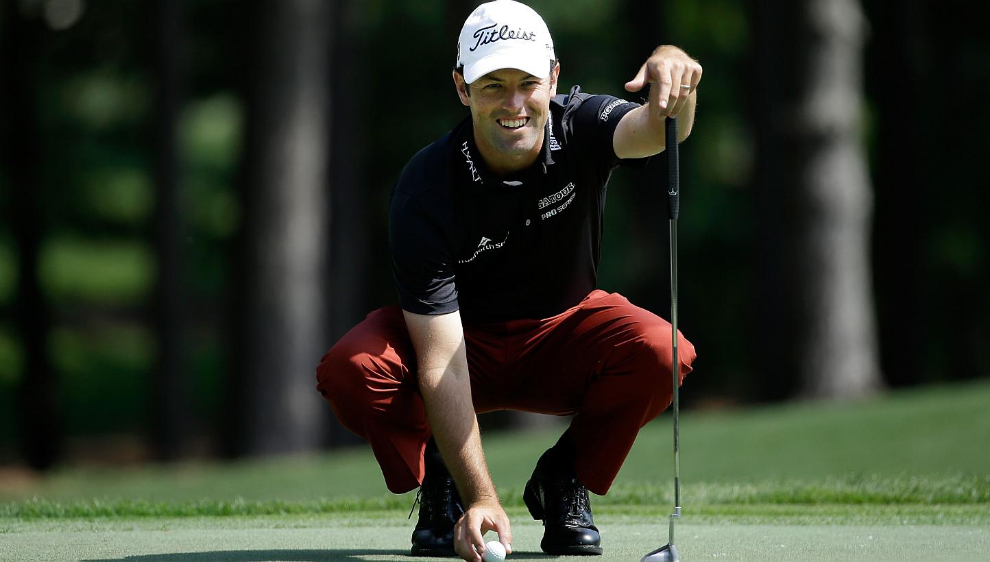 Robert Streb lining up a putt on the first hole during round one at the Wells Fargo Championship at Quail Hollow Club on May 14, 2015. -- PHOTO: AFP