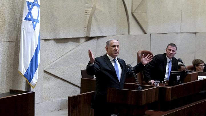 Israeli Prime Minister Benjamin Netanyahu delivers a speech in the Knesset, the Israeli parliament, before his new government is sworn in following the mid-March general elections, in Jerusalem May 14, 2015. -- PHOTO: REUTERS