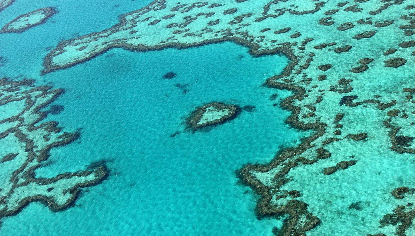 An aerial view of the Great Barrier Reef off the coast of the Whitsunday Islands, along the central coast of Queensland. -- PHOTO: AFP