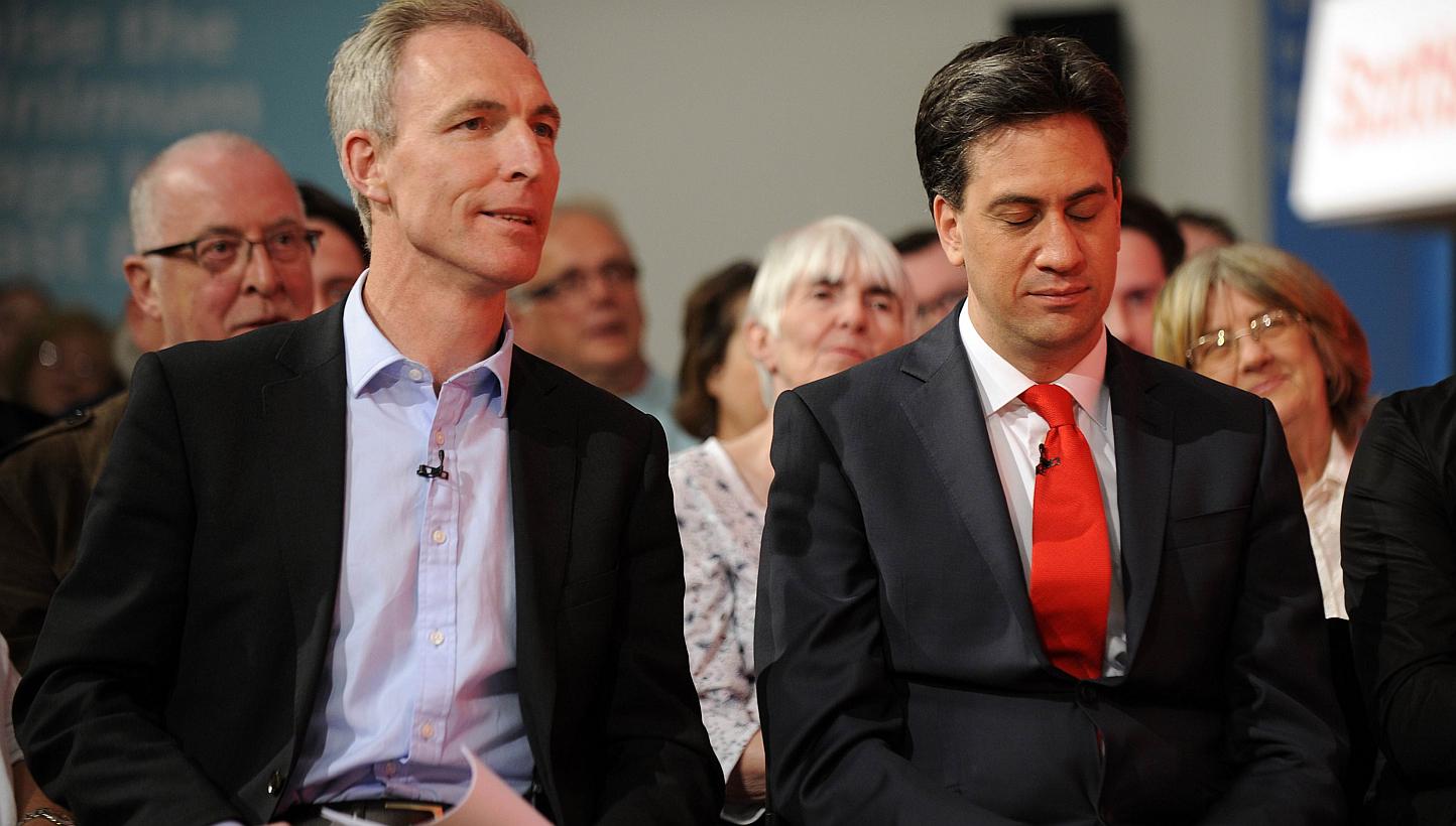 Scottish Labour Party leader Jim Murphy (left) sits with opposition&nbsp;Labour Party leader Ed Miliband (right)&nbsp;at a Labour Party general election campaign rally in Glasgow, Scotland, on May 1, 2015. -- PHOTO: AFP