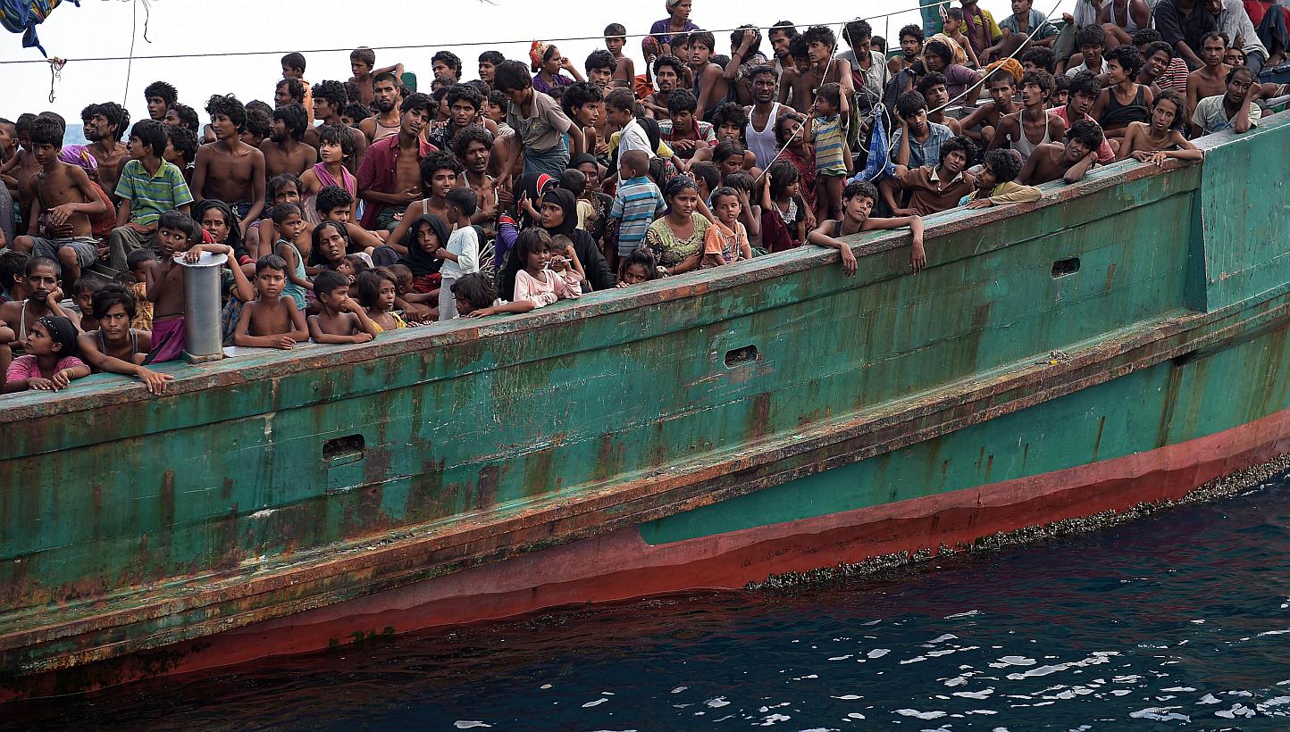Rohingya migrants on a boat drifting in Thai waters off the southern island of Koh Lipe in the Andaman on May 14, 2015. -- PHOTO: AFP