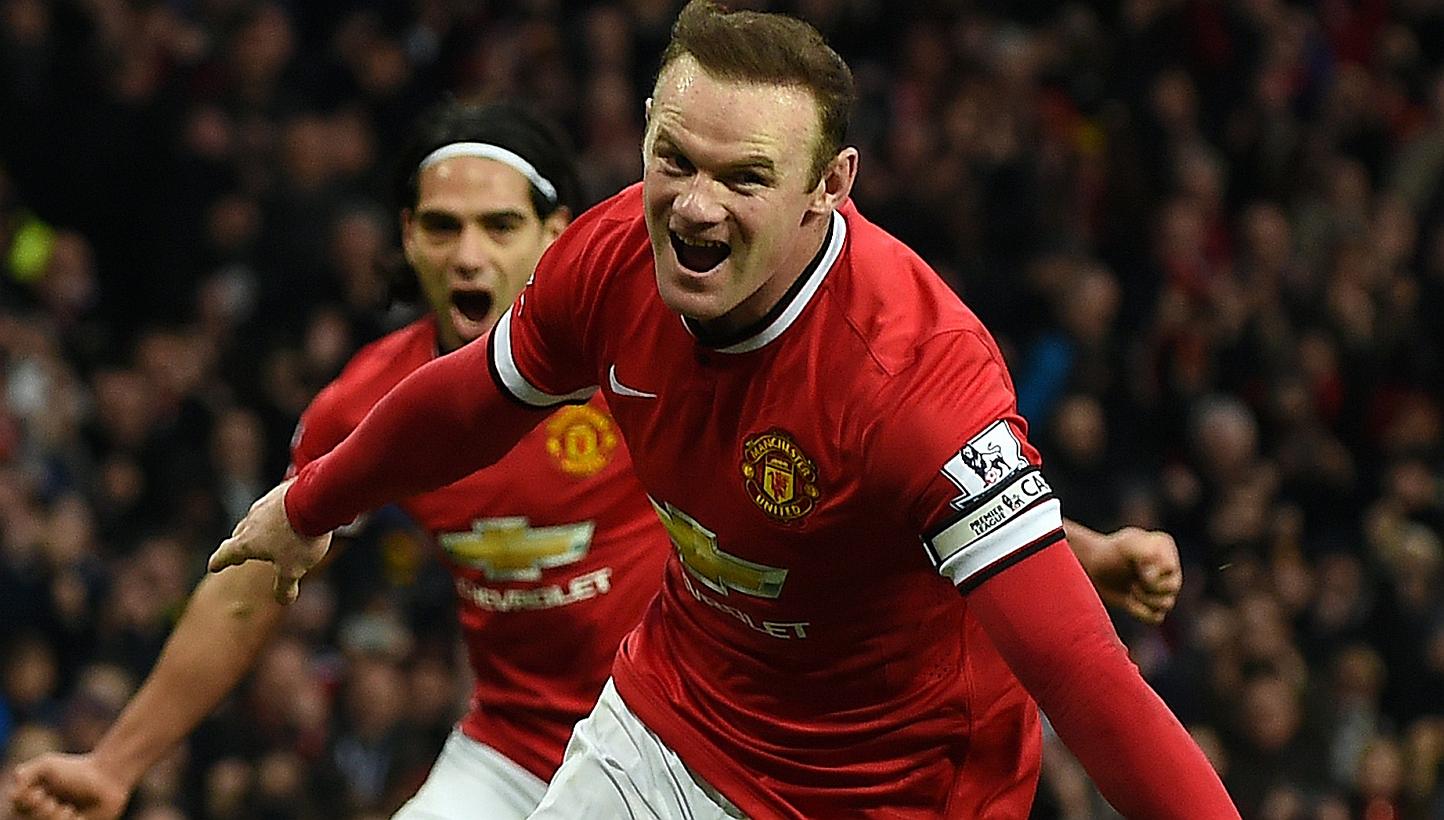Manchester United's Wayne Rooney celebrates scoring a penalty during a match against Sunderland on Feb 28, 2015. Manchester United captain Rooney and left back Luke Shaw will miss the Premier League game against Arsenal on Sunday due to injury.