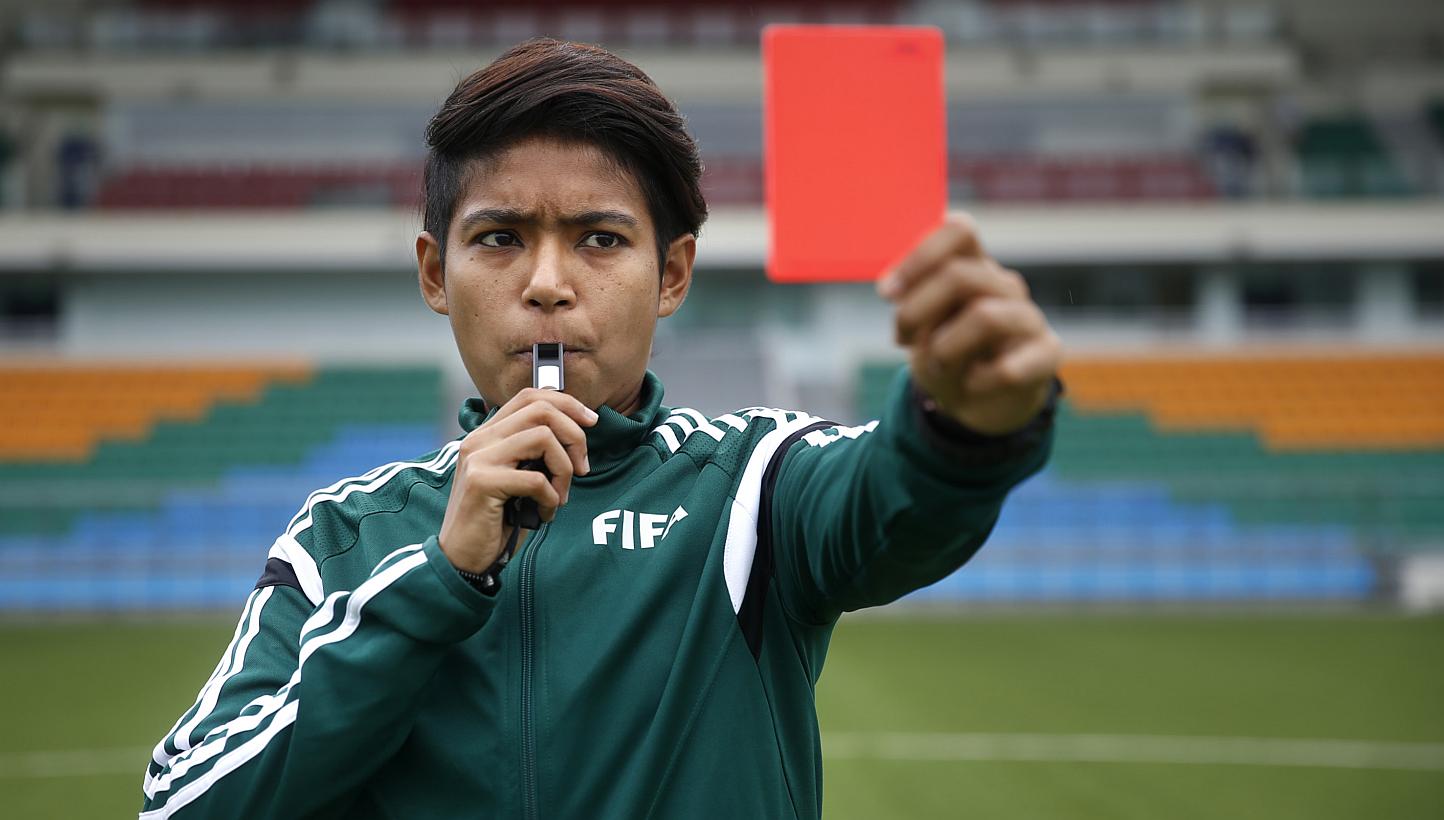 Singaporean football referee Abirami Naidu will complete a unique treble when she takes up the whistle at next month's Women's World Cup in Canada, having already officiated in the Women's World Cup at the Under-17 level in Costa Rica last year and t