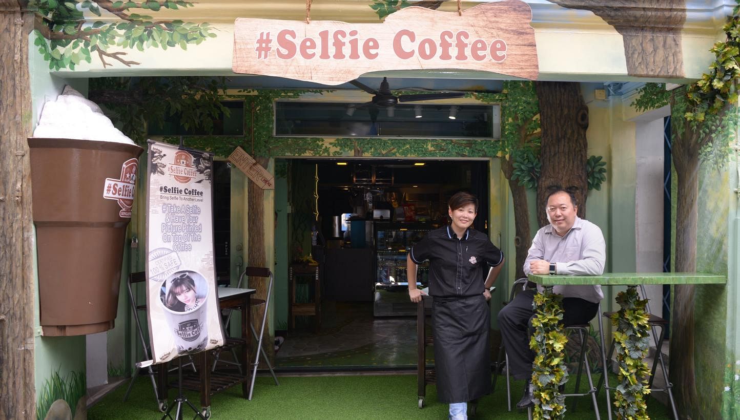 Operations manager Yves Zhuang (left) and Mr Eddy Chan (right), director of Avril Cafe, which opened Selfie Coffee in Haji Lane. -- ST PHOTO: DANIEL NEO