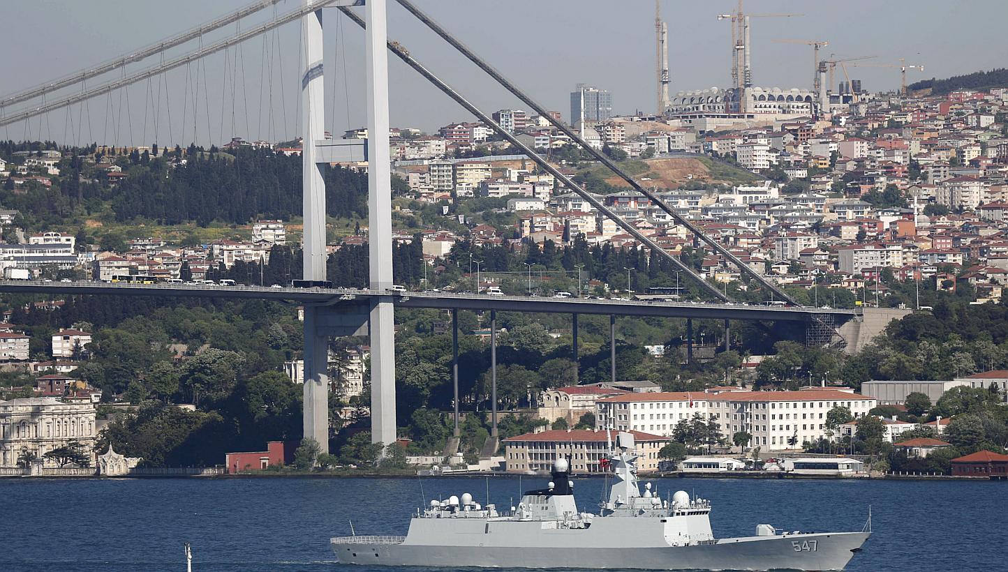 Chinese People's Liberation Army (PLA) navy frigate Linyi sets sail in the Bosphorus, on its way to the Mediterranean Sea, in Istanbul, Turkey on May 14, 2015. Nine Russian and Chinese navy vessels gathered in the Mediterranean Sea for joint military