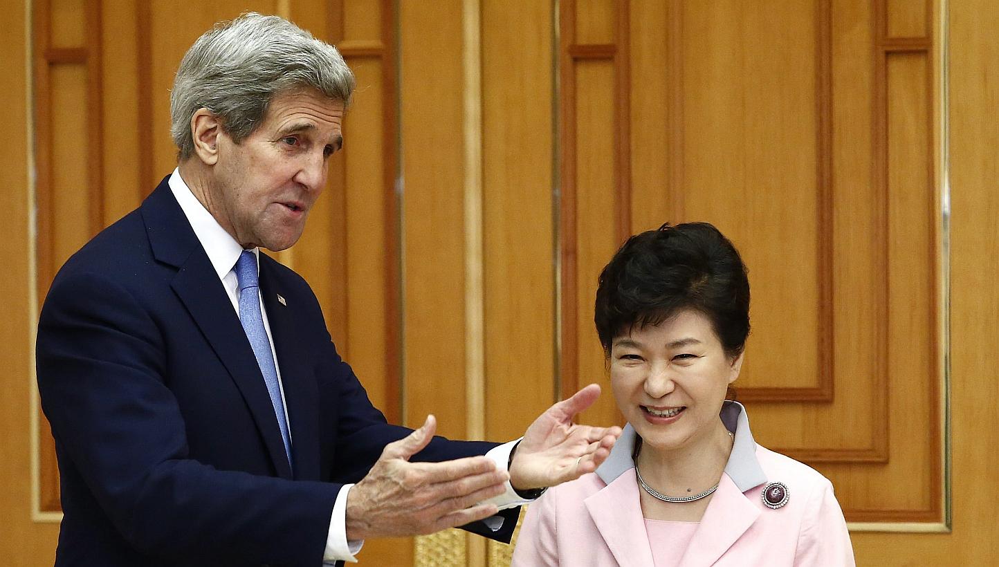 US Secretary of State John Kerry (left) talking to South Korean President Park Geun Hye at the Presidential Blue House in Seoul, South Korea on May 18, 2015. -- PHOTO: EPA
