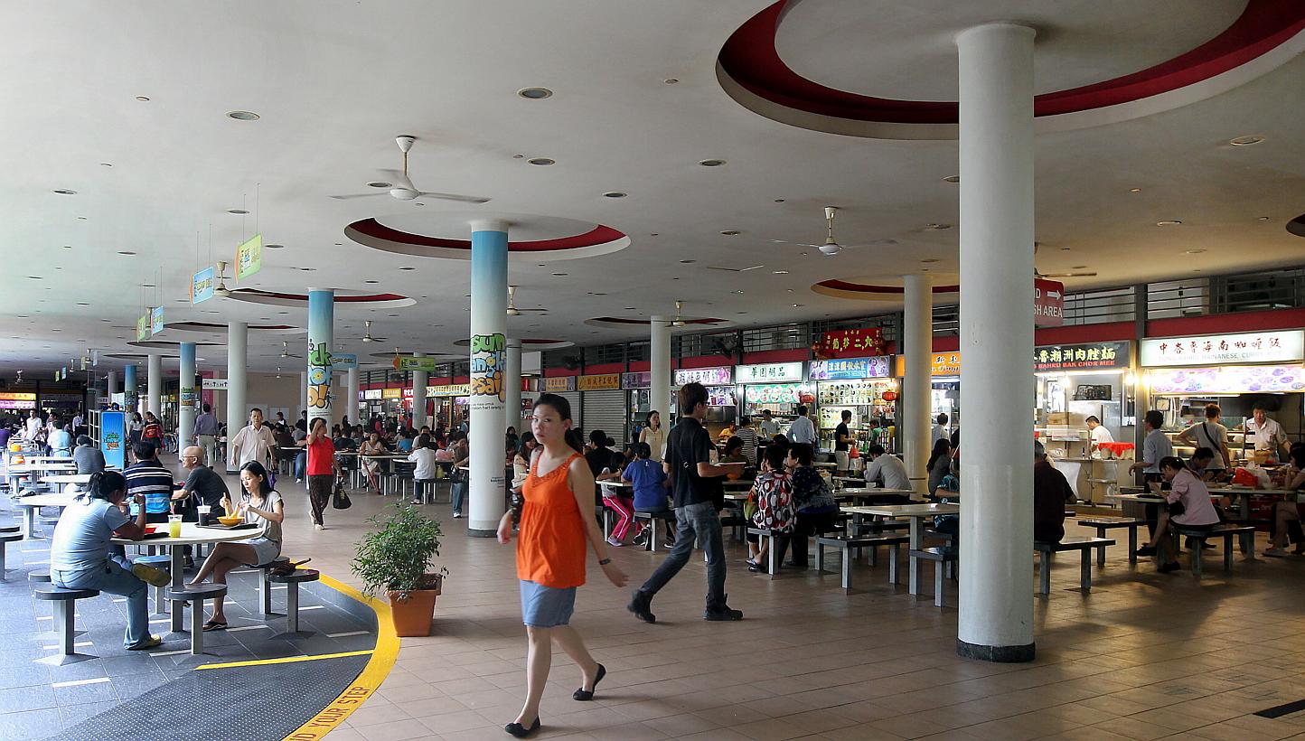 Both Tiong Bahru Market (above) and Ang Mo Kio Block 628 Market each generate more than 1 tonne of food waste per day. -- PHOTO: BERITA HARIAN FILE 