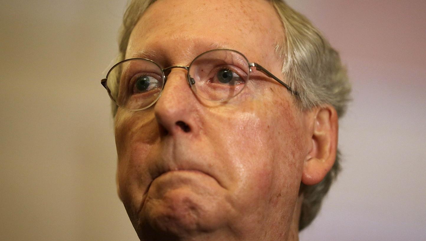 US Senate Majority Leader Sen. Mitch McConnell (Republican- Kentucky) pauses as he speaks to members of the media after the weekly Senate Republican Policy Luncheon on May 12 in Washington, DC.-- PHOTO: AFP