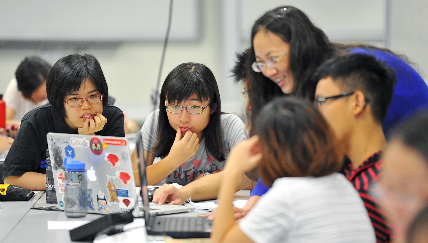 First-year undergraduates during a physics class at the Singapore University of Technology and Design (SUTD) on May 15, 2015. -- PHOTO: LIM YAOHUI FOR THE STRAITS TIMES
