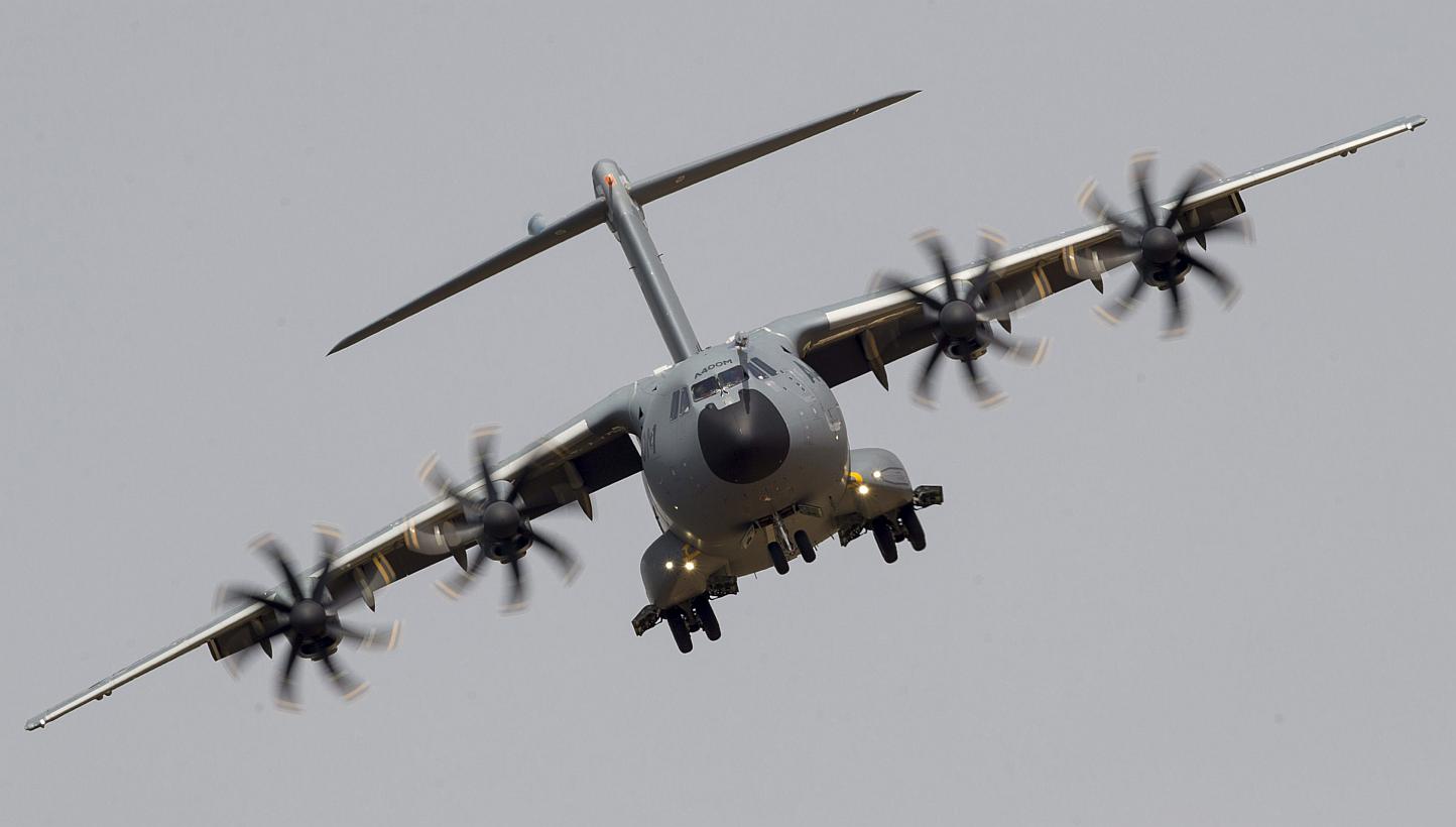 An Airbus A400M approaches for landing in the first test flight after another A400M crashed on May 9, 2015, at the San Pablo airport in Seville, Andalusia, Spain on May 12. Airbus Defence & Space on Tuesday ordered engine software checks on the A