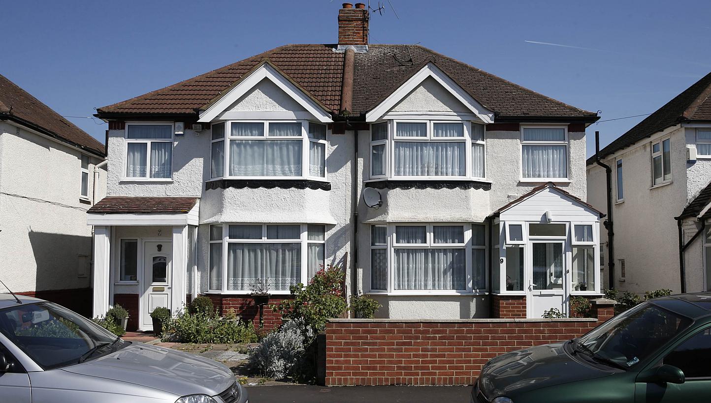 A semi-detached house, (right), the registered address of Nav Sarao Futures Ltd, a trading company operated by Navinder Singh Sarao, is pictured in Hounslow, west of London on April 22, 2015. -- PHOTO: AFP
