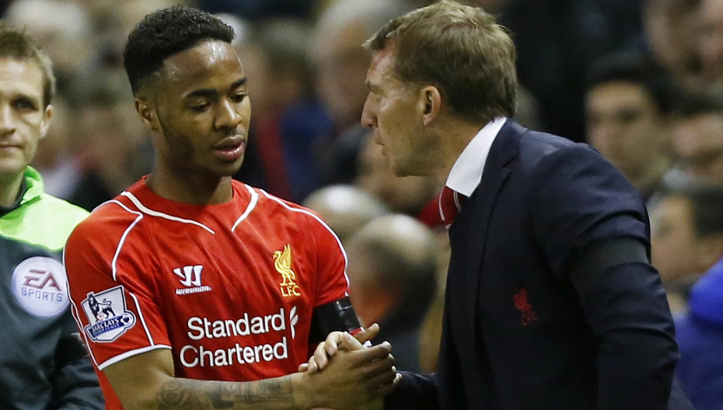 Liverpool winger Raheem Sterling (left) could add to manager Brendan Rodgers' (right) Anfield woes, as speculation mounts that he could hand in a transfer request. -- PHOTO: REUTERS