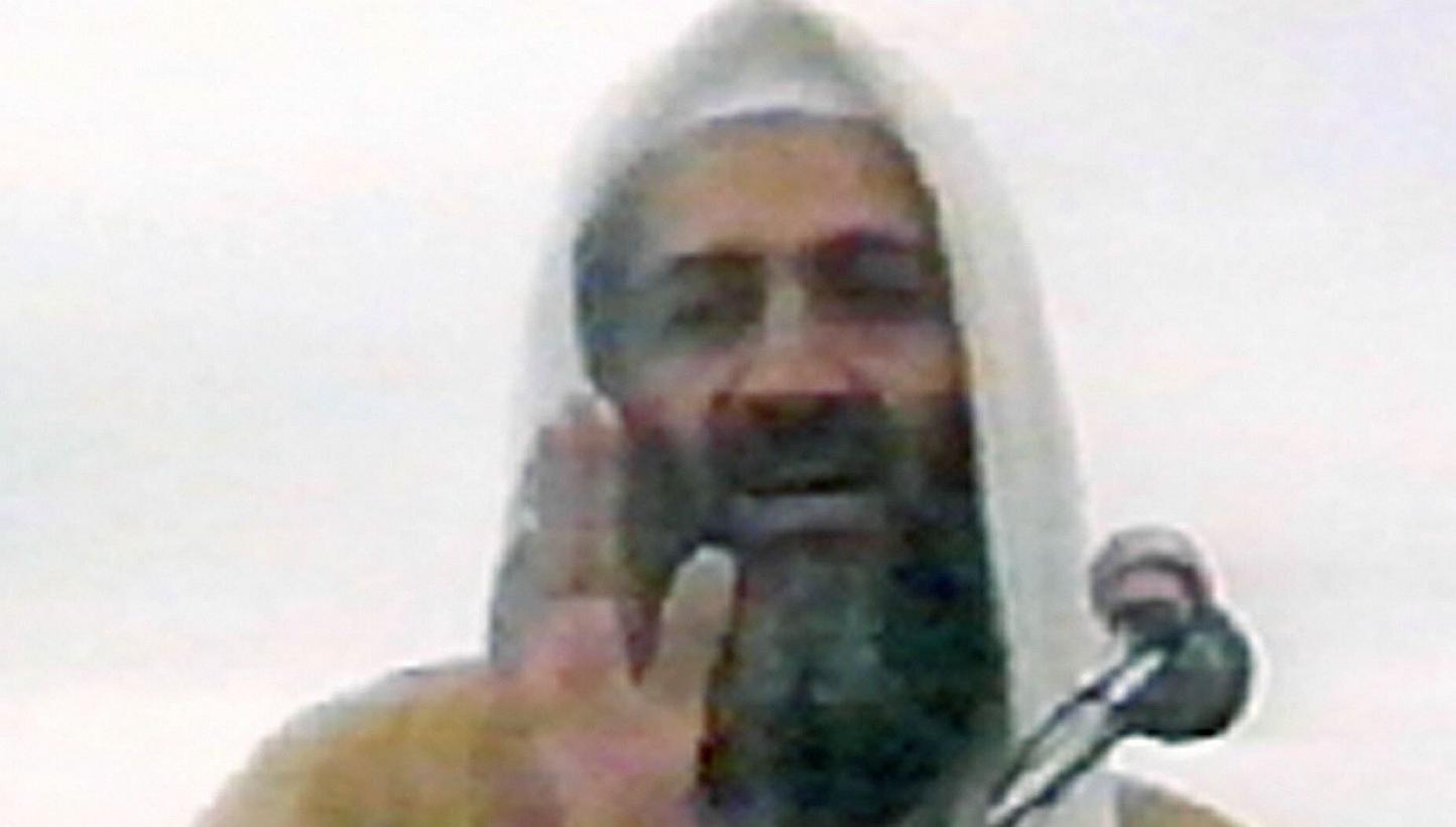 This undated image grab shows Osama bin Laden speaking at an undisclosed location in Afghanistan from a video said to have been prepared by bin Laden himself. -- PHOTO: AFP