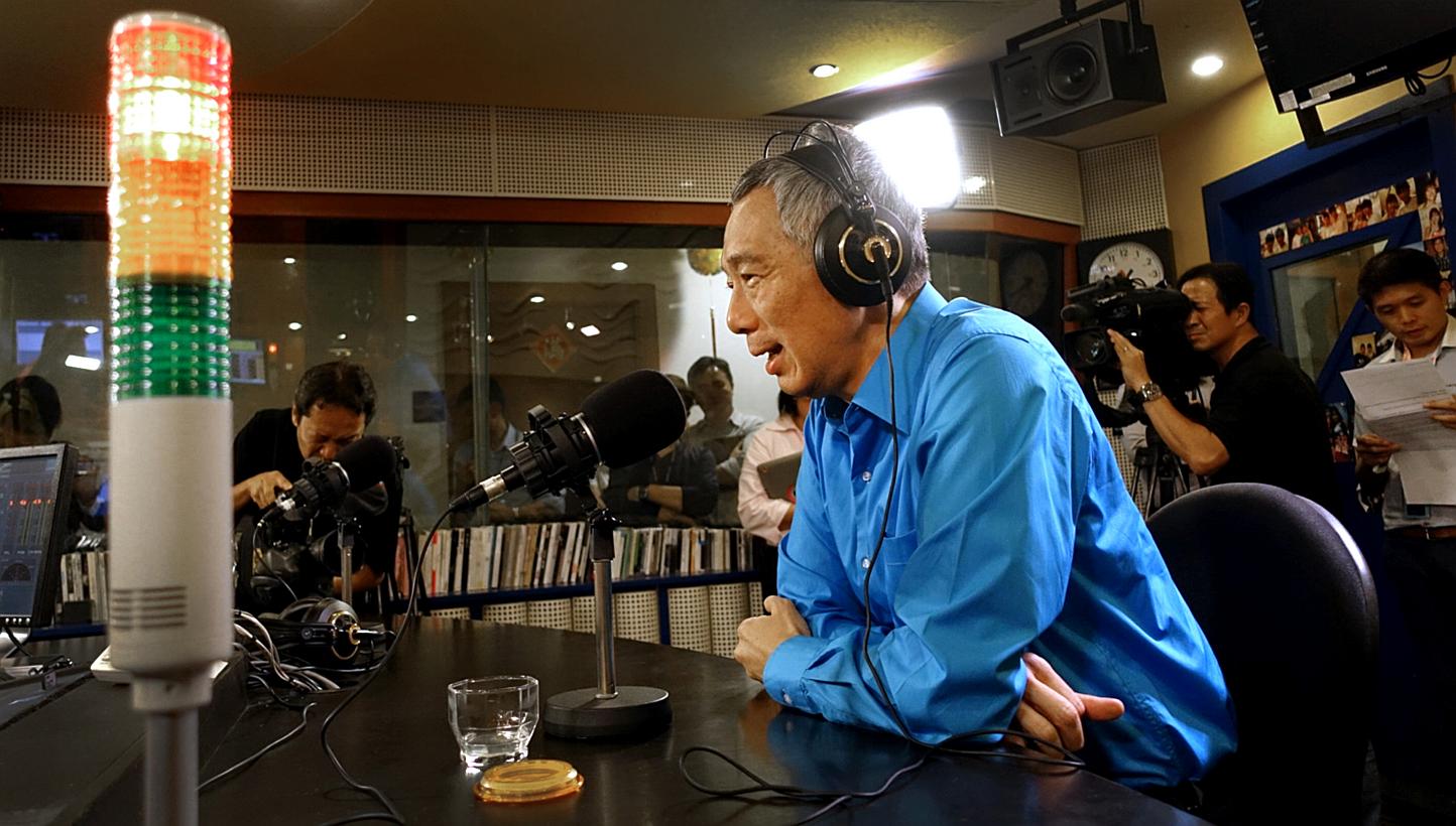 PM Lee Hsien Loong speaking on Capital 95.8 FM's live weekly programme On Air With Minister last night, where he urged Singaporeans not to take their votes lightly.