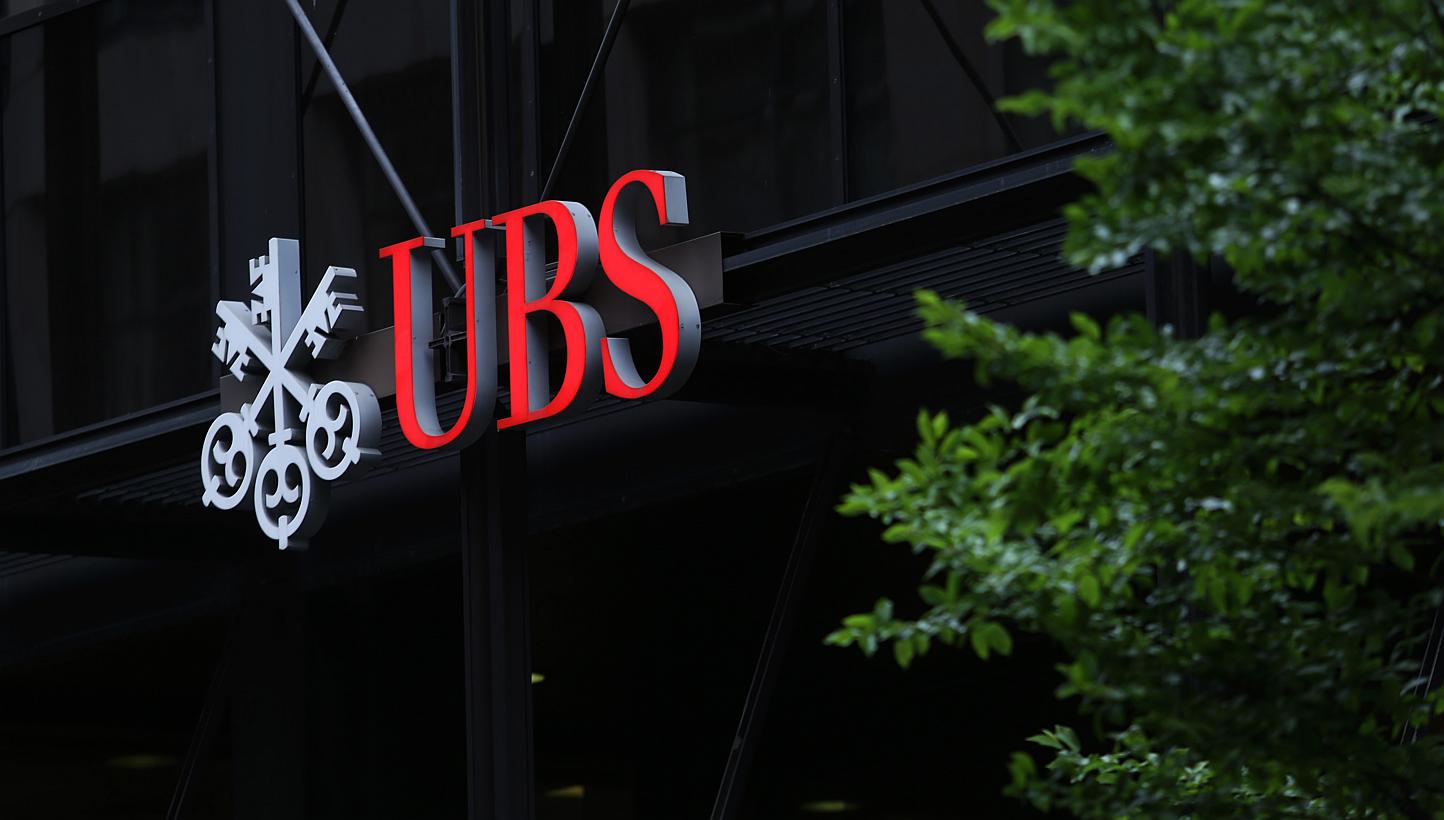 Swiss bank UBS said its main unit will plead guilty to fraud in the US for manipulating benchmark interest rates and pay US$203 million (S$271 million) in fresh fines after the bank violated an agreement that had allowed it to avoid prosecution. -- P