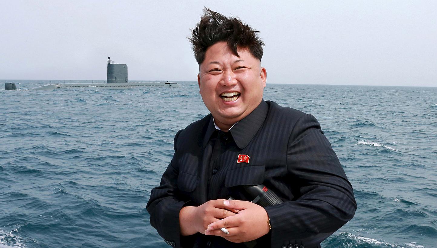 North Korean leader Kim Jong Un watches the test-fire of a strategic submarine underwater ballistic missile (not pictured), in this undated photo released by North Korea's Korean Central News Agency (KCNA) in Pyongyang on May 9, 2015. North Kore