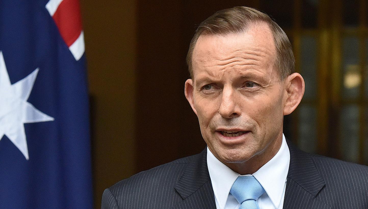 Australian Prime Minister Tony Abbott on Thursday ruled out helping to resettle the wave of migrants fleeing to South-east Asia, saying it would worsen the problem and "encourage people to get on boats". -- PHOTO: BLOOMBERG