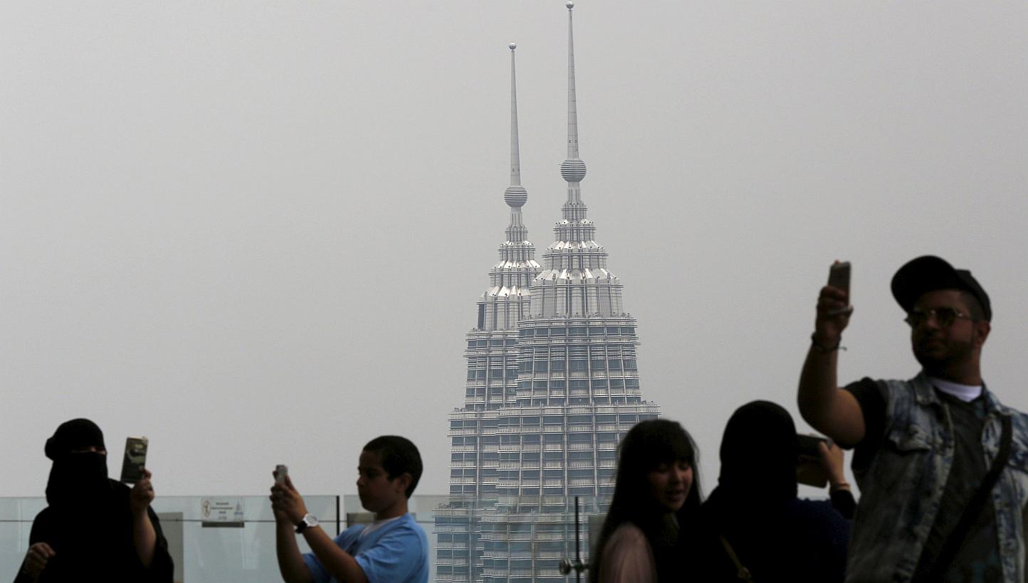 Prime Minister Najib Razak said on Thursday that Malaysia's real gross domestic product will grow between 5 and 6 per cent annually from 2016 to 2020, resulting in a 7.9 per cent per annum rise in gross national income (GNI) per capita. -- PHOTO: REU