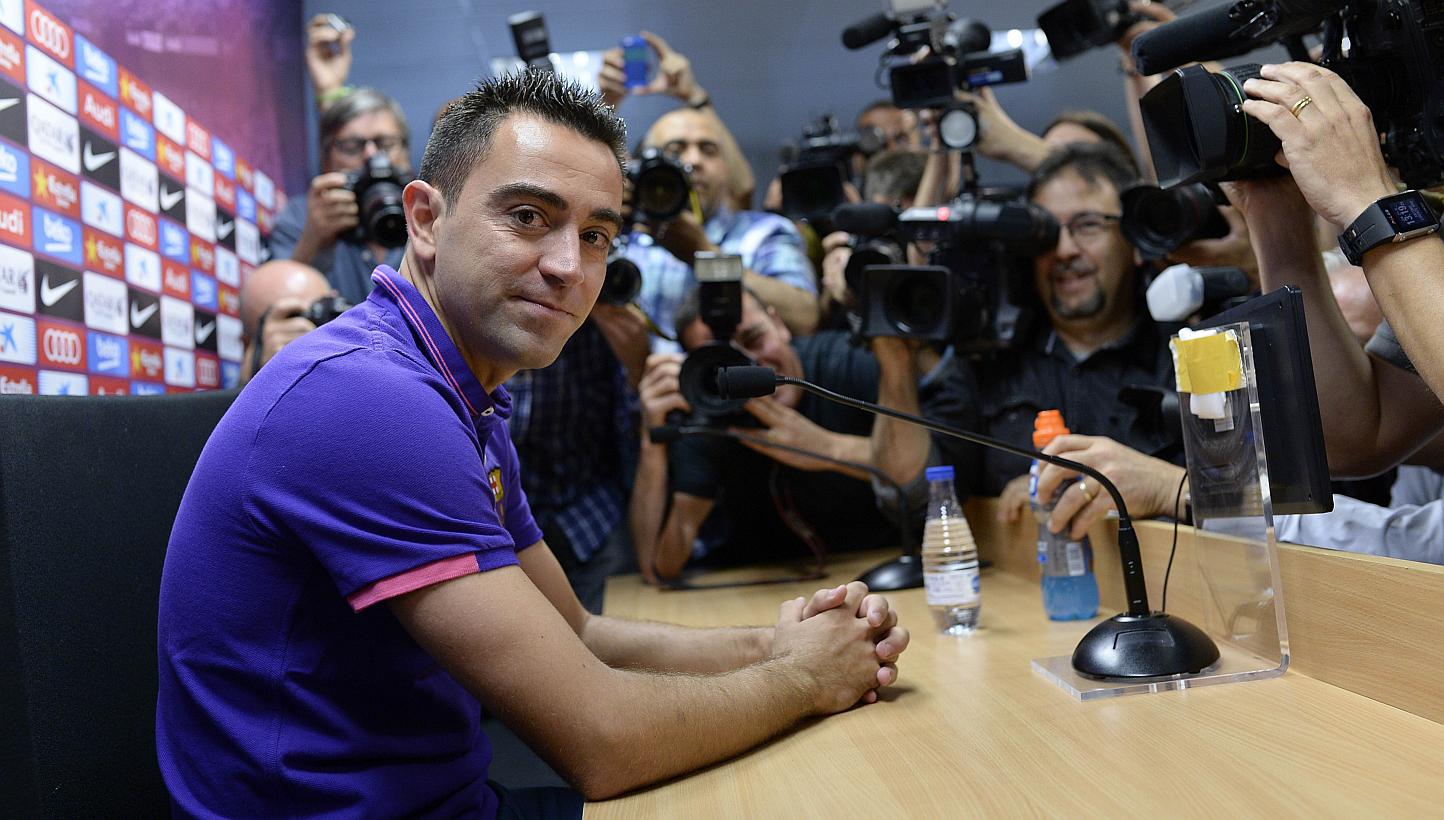 Barcelona legend Xavi Hernandez confirmed on Thursday that he will end his 17-year playing career with the Catalans at the end of the season to join Qatari side Al Sadd. -- PHOTO: AFP 