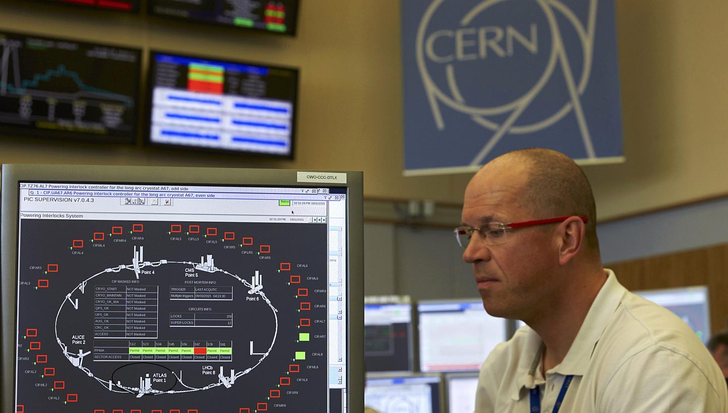 A technician works in the Control Centre of the Large Hadron Collider (LHC) at the European Organisation for Nuclear Research (Cern) in Prevessin near Geneva on March 11, 2015.&nbsp;TheLHC broke the record for energy levels late on Wednesday, May 20,
