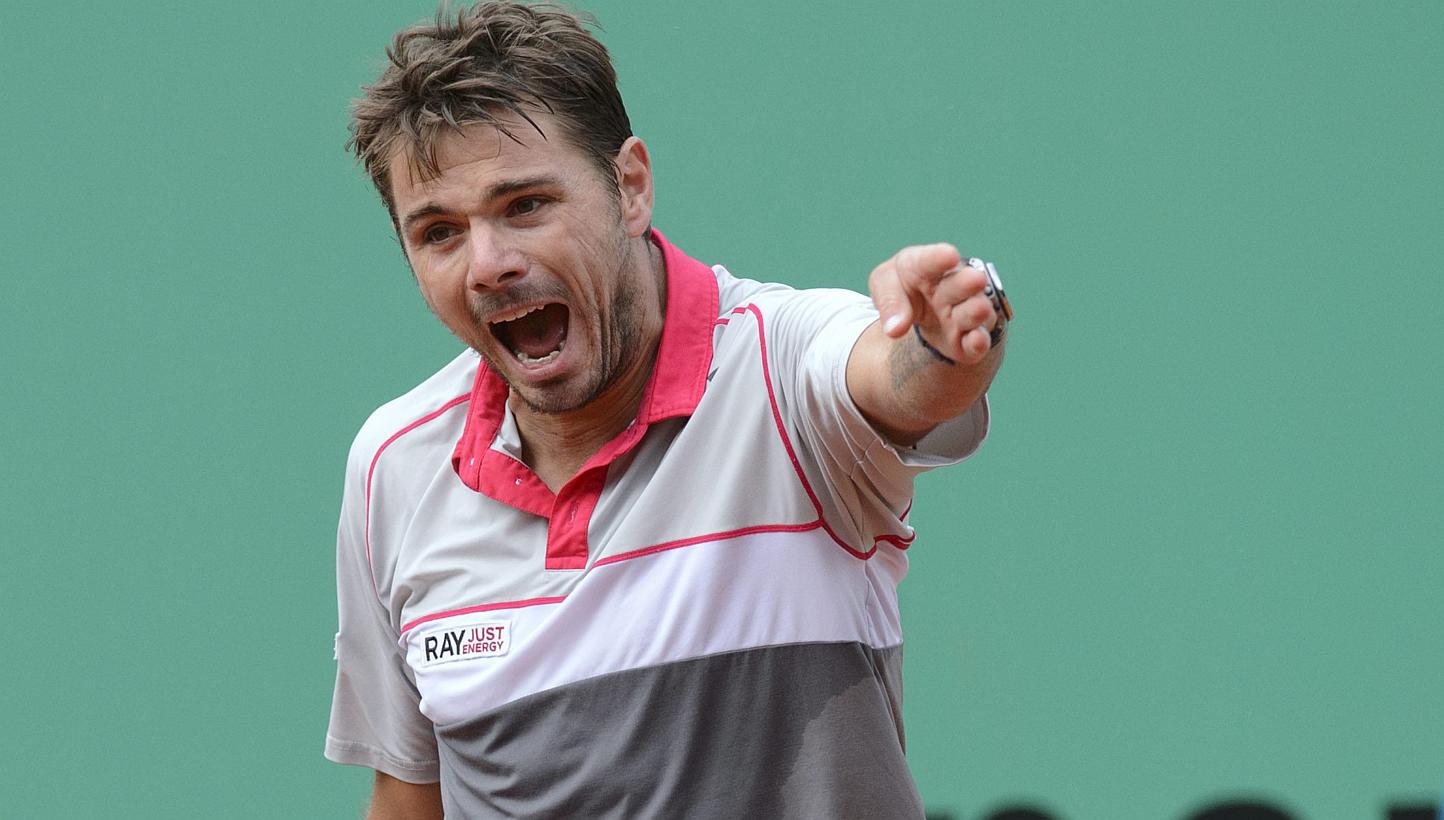 Switzerland's Stan Wawrinka reacts after losing a point to Lukas Rosol of the Czech Republic in the Geneva Open on May 20, 2015. -- PHOTO: EPA