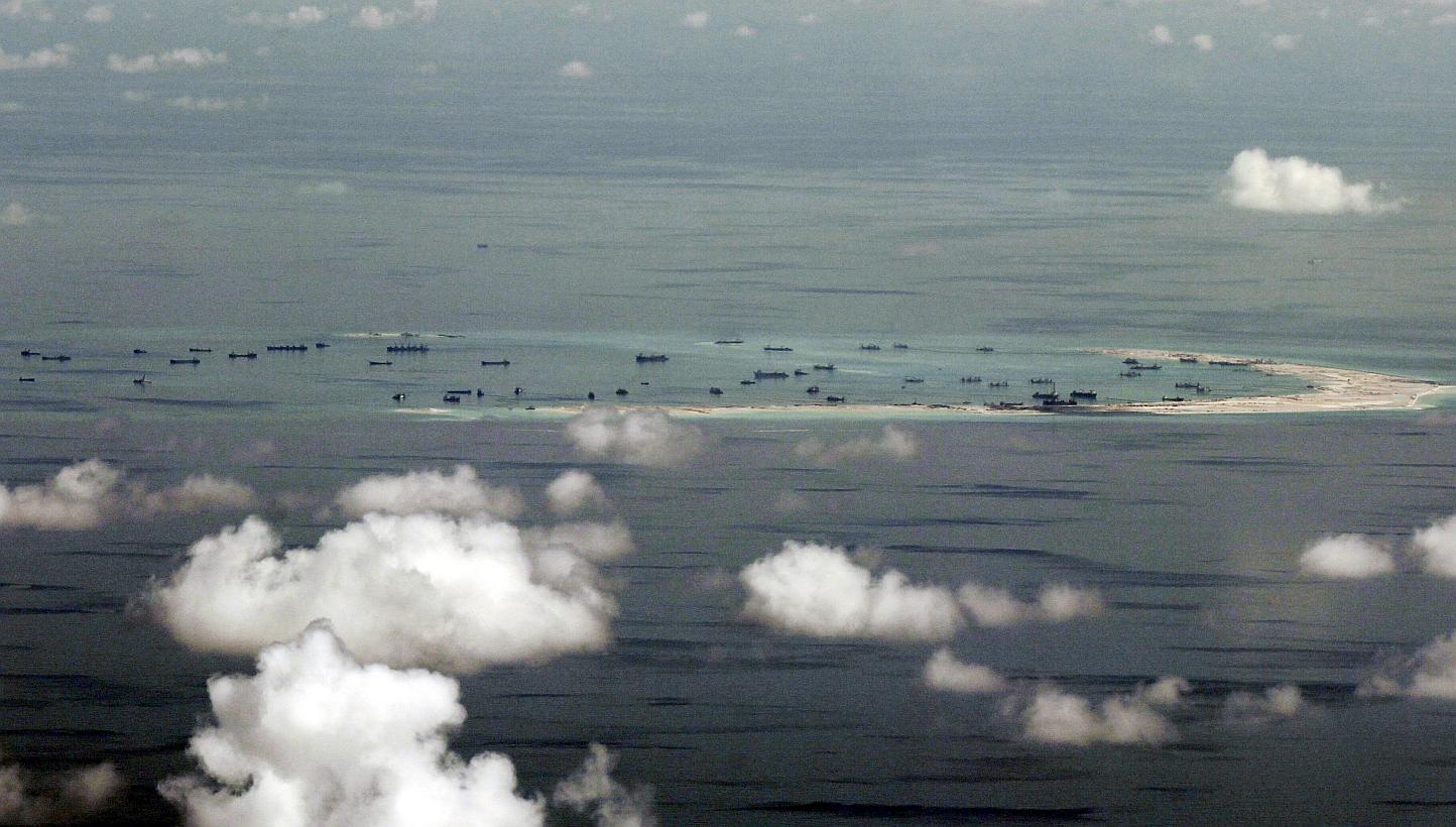 US officials have said they are weighing sending warships and surveillance aircraft within 12 nautical miles of the man-made islands in the South China Sea to test Beijing's controversial territorial claims. -- PHOTO: REUTERS