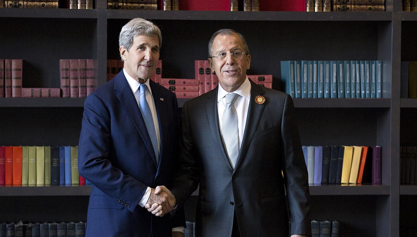 US Secretary of State John Kerry (left) shakes hands with Russian Foreign Secretary Sergei Lavrov before a bilateral meeting in Sochi, Russia May 12, 2015. Russian Foreign Minister Sergei Lavrov discussed the situation in Syria and Yemen as well as U