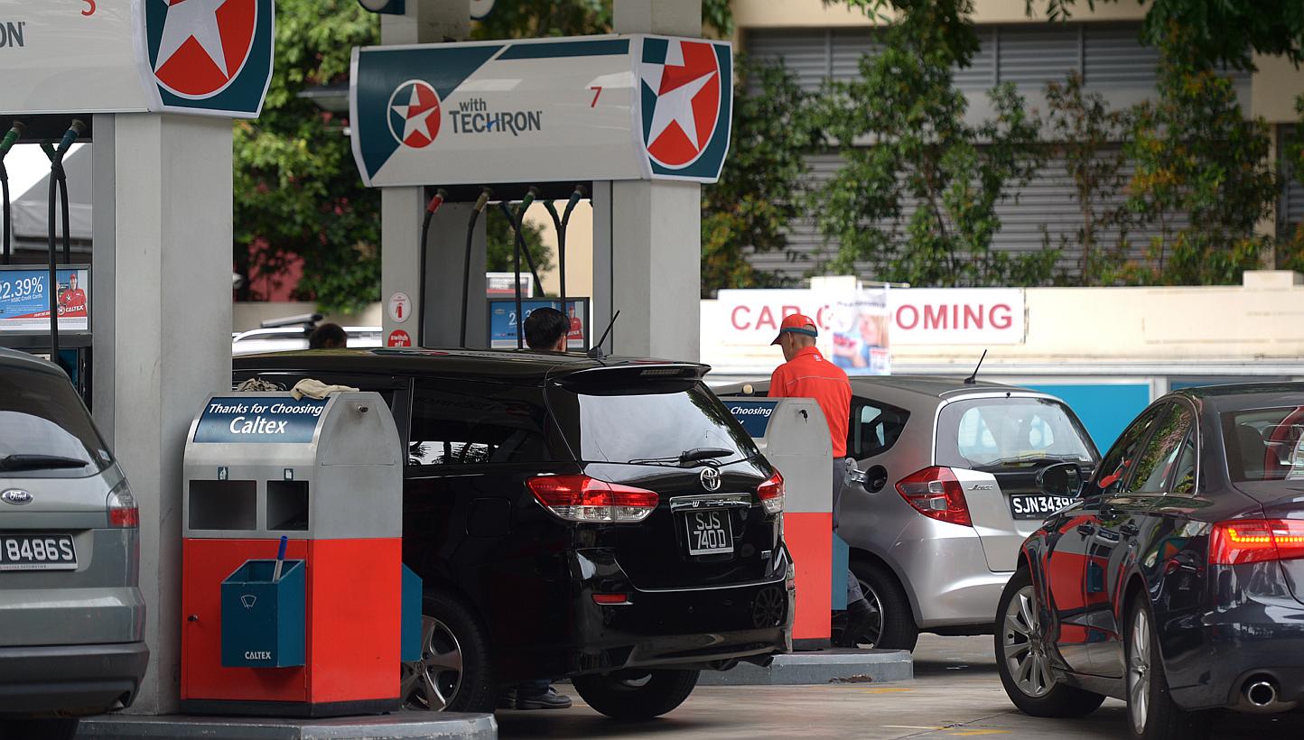 Pump prices have increased twice this month, with motorists now having to fork out up to six cents more a litre for their petrol. -- ST PHOTO:&nbsp;JAMIE KOH