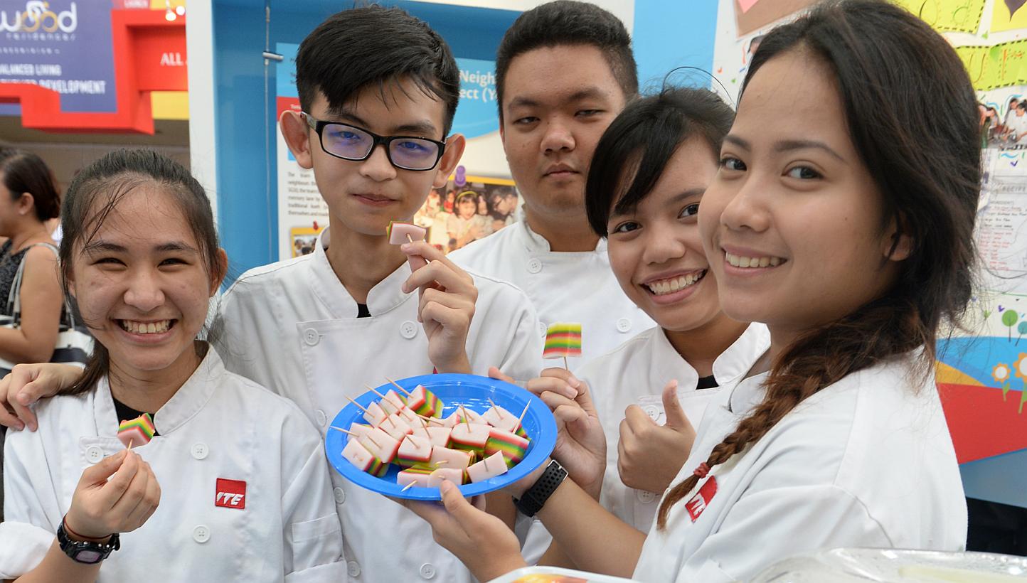 (From Left) ITE West students Lim Yi Cin, Poh Zen Feng, Nelson Yeo, Hidayu Salim and Nazirah Arianie, all aged 18. They organised a baking class at Chua Chu Kang Community Club and taught about a hundred residents how to make traditional bites such a