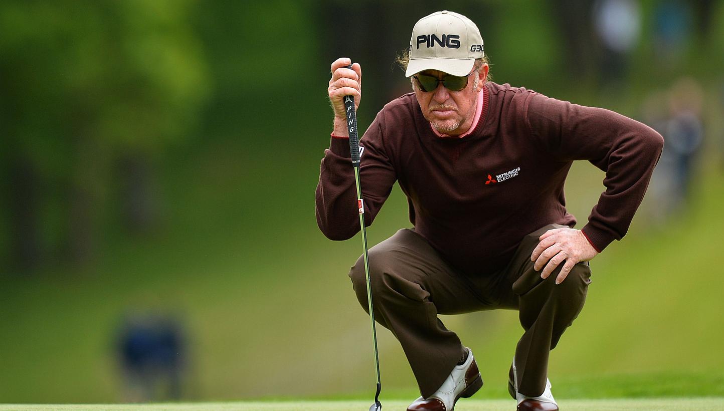 Spanish golfer Miguel Angel Jimenez lines up his put on the 1st green on the second day of the PGA Championship at Wentworth Golf Club in Surrey, south west of London, England, on May 22, 2015. -- PHOTO: AFP